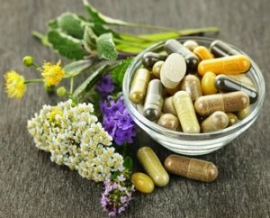 Herbs with alternative medicine herbal supplements and pills